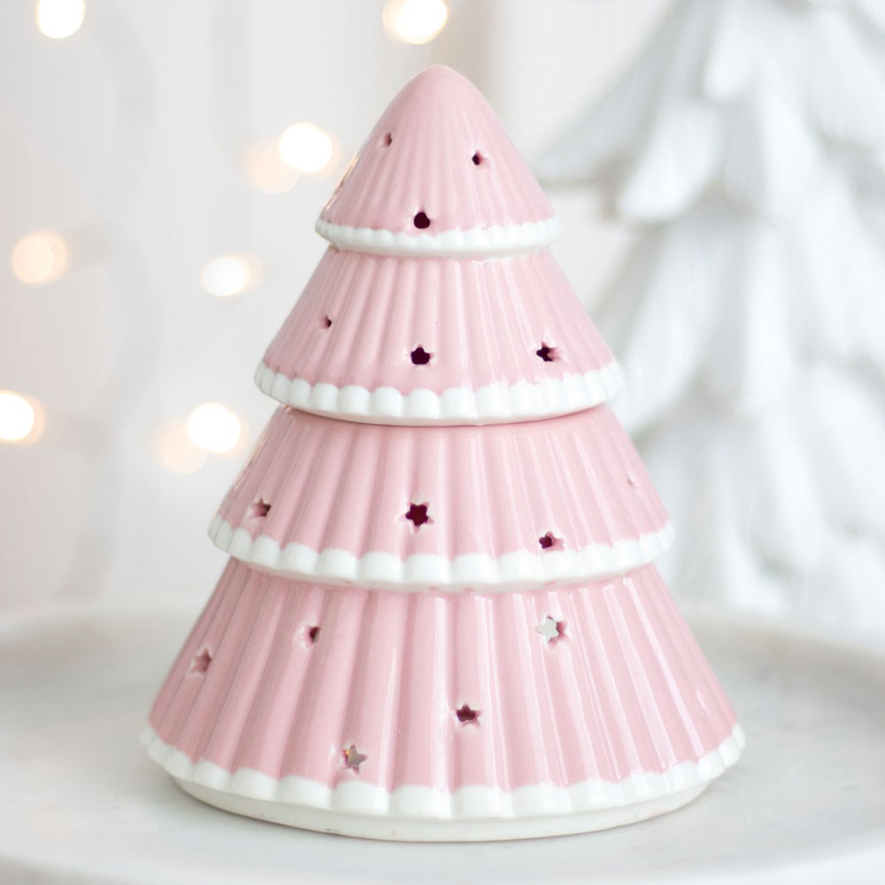 Pink ceramic Christmas tree oil burner with star cut-out details by Twink Candle Company