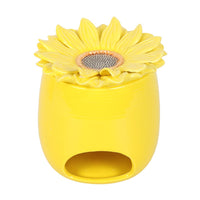 Sunflower wax and oil burner by Twink Candle Company, a yellow ceramic burner with a sunflower top