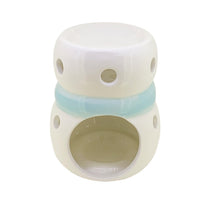 Rear of the snowman wax and oil burner by Twink Candle Company, showing the tea light opening