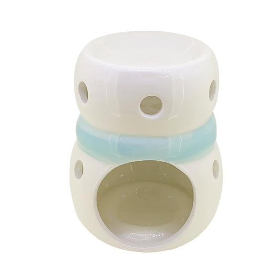 Rear of the snowman wax and oil burner by Twink Candle Company, showing the tea light opening