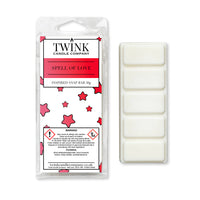Spell Of Love inspired 50g soy wax melt snap bar in its packet beside the unwrapped bar and its five break-apart segments