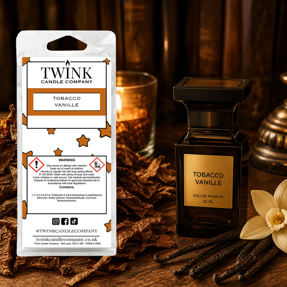 Tobacco Vanille soy wax melt snap bar by Twink Candle Company, styled in a warm, moody amber setting
