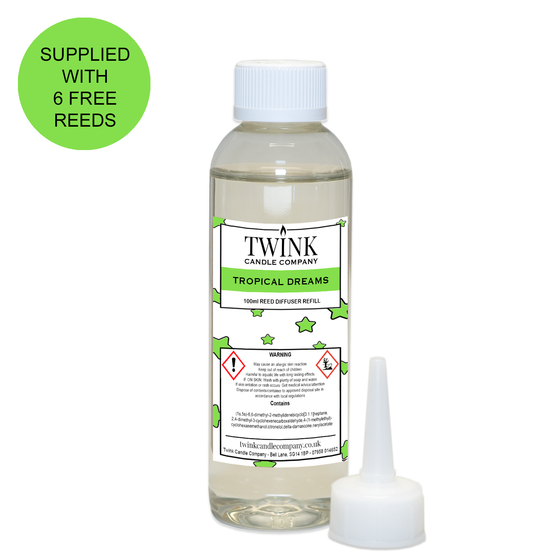 Tropical Dreams reed diffuser refill by Twink Candle Company, a 100ml bottle with pouring nozzle and six free reeds