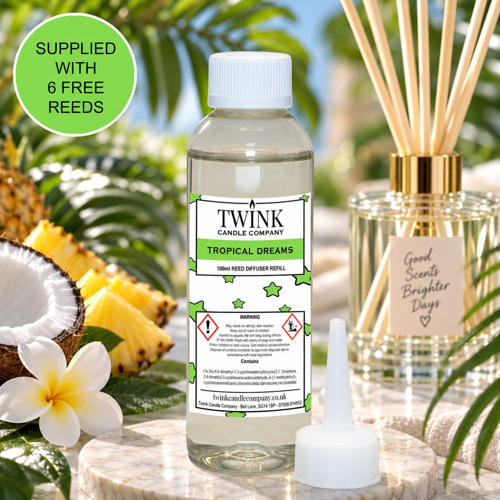 Tropical Dreams reed diffuser refill by Twink Candle Company, a 100ml bottle with tropical fruit and flowers