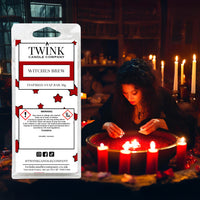 Witches Brew soy wax melt snap bar by Twink Candle Company, in a bubbling cauldron Halloween scene