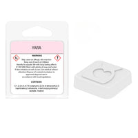 Back of the Yara inspired snap bar packet showing contents and safety information, with a heart-shaped wax sample