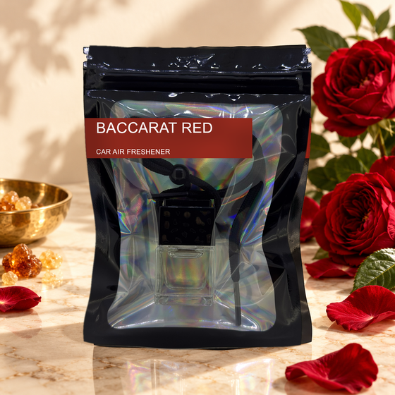Baccarat Red car air freshener by Twink Candle Company, hanging vent diffuser styled in a home setting