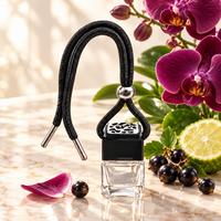 Black Orchid car air freshener by Twink Candle Company, hanging car vent clip diffuser