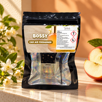 Bossy car air freshener by Twink Candle Company, packet styled in a home setting