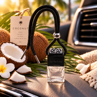 Coconut car air freshener by Twink Candle Company, hanging car vent clip diffuser