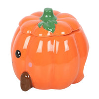 Cute smiling pumpkin wax/oil burner by Twink Candle Company, angle view