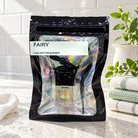 Fairy car air freshener by Twink Candle Company, hanging vent diffuser styled in a home setting