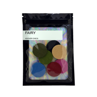 Pack of 8 Fairy scented hoover discs in its sealed black foil packet on a plain white background