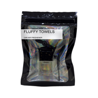 Fluffy Towels car air freshener by Twink Candle Company, hanging car vent clip diffuser on a white background