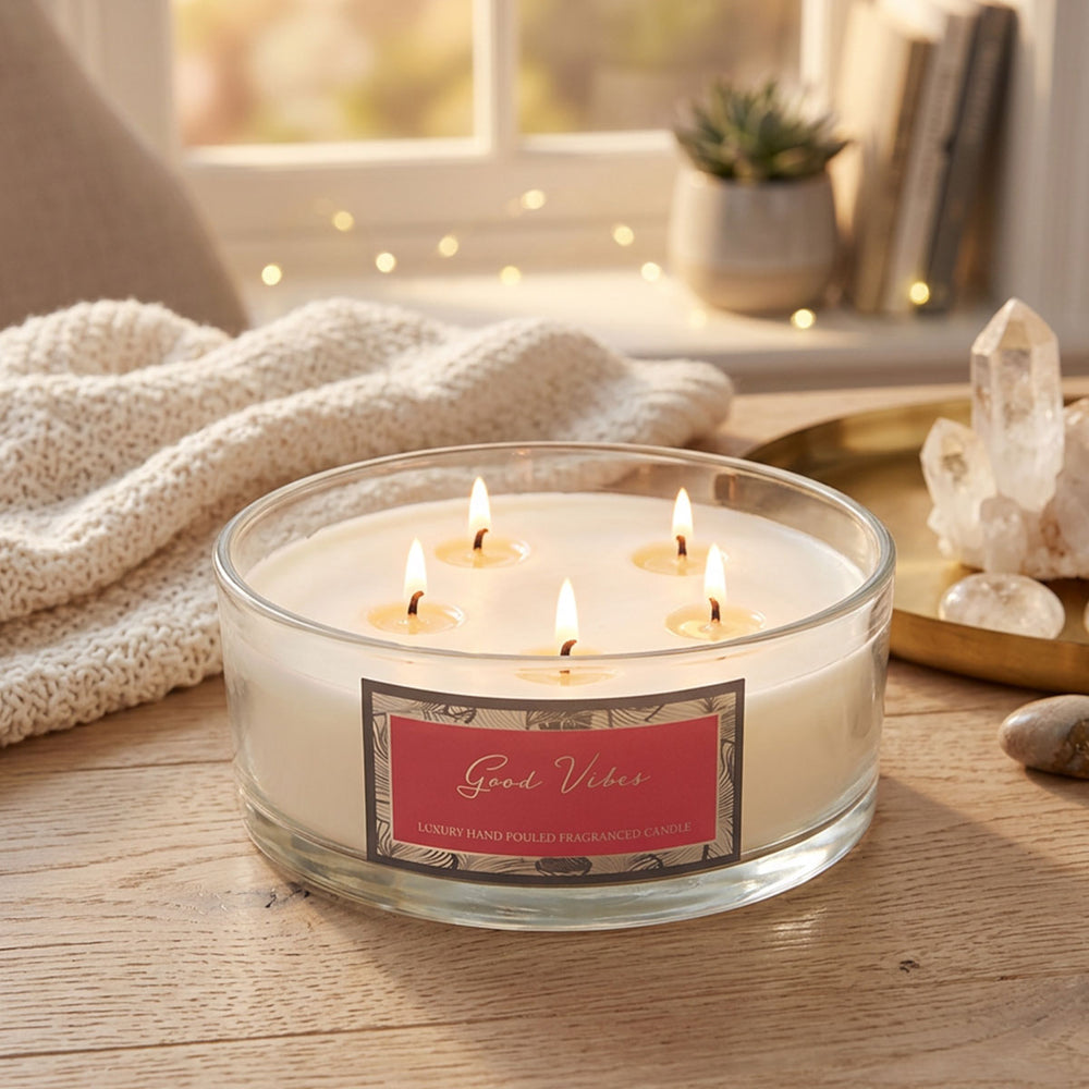 Woodbridge Good Vibes 5-wick 990g candle bowl — large frosted glass bowl candle glowing in a bright, uplifting home setting