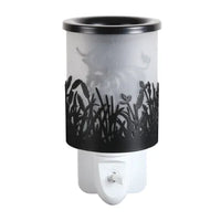 Highland Cow Black Shadow plug-in wax melt burner, unlit, showing the black cut-out ceramic design