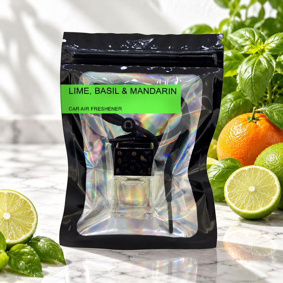 Lime, Basil & Mandarin car air freshener by Twink Candle Company, hanging vent diffuser styled in a home setting