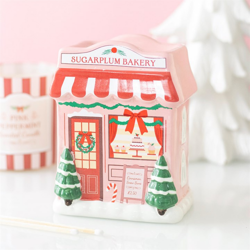 Sugarplum Bakery ceramic oil burner by Twink Candle Company — festive candy-cane bakery design with a tealight recess and fragrance-oil dish