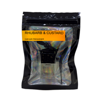 Rhubarb and Custard car air freshener by Twink Candle Company, hanging car vent clip diffuser on a white background