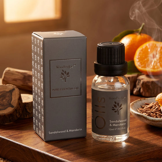 Woodbridge Sandalwood & Mandarin essential oil 15ml — amber fragrance oil bottle for burners and diffusers, in a warm, woody setting