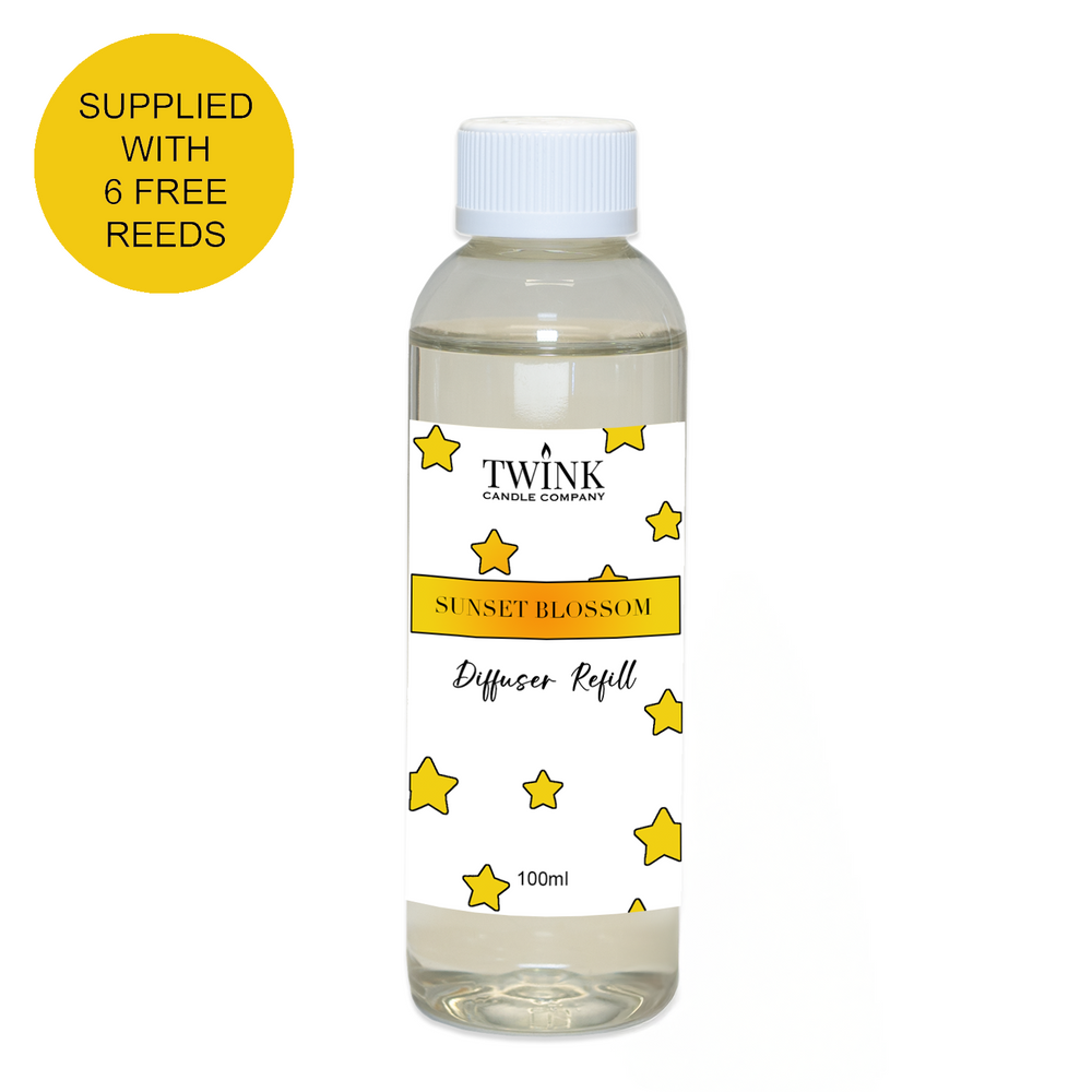 Sunset Blossom diffuser refill by Twink Candle Company, a clear 100ml bottle with a white cap and yellow star label, supplied with 6 free reeds