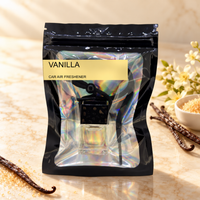 Vanilla car air freshener by Twink Candle Company, hanging vent diffuser styled in a home setting
