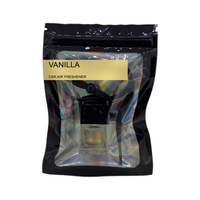 Vanilla car air freshener by Twink Candle Company, hanging car vent clip diffuser on a white background