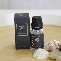 Woodbridge Coastal Sunset essential oil 15ml bottle and box styled lifestyle