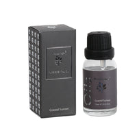 Woodbridge Coastal Sunset essential oil 15ml bottle and box on a white background
