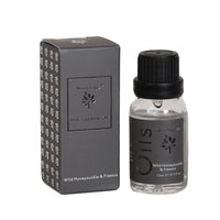 Woodbridge Honeysuckle & Freesia essential oil 15ml bottle and box on a white background