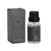 Woodbridge Orchid & Bamboo essential oil 15ml bottle and box on a white background