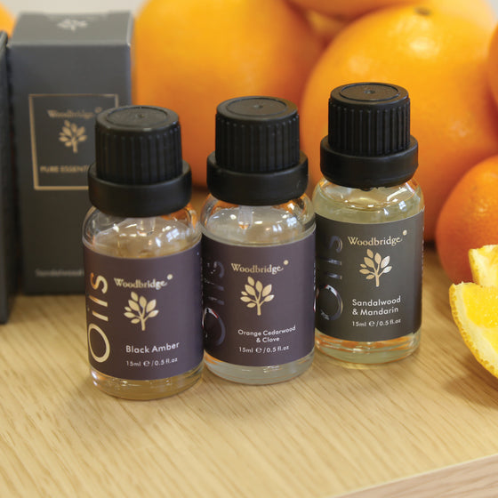 Woodbridge Orange Cedarwood & Clove essential oil 15ml bottle and box styled lifestyle