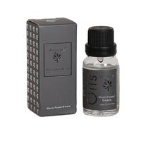 Woodbridge Warm Forest Breeze essential oil 15ml bottle and box on a white background