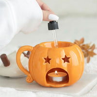 Whipped cream pumpkin wax/oil burner by Twink Candle Company, adding fragrance oil
