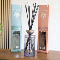 Woodbridge 1000ml reed diffuser range styled on a sideboard