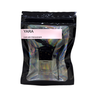 Yara car air freshener by Twink Candle Company, hanging car vent clip diffuser on a white background