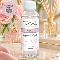 Yara reed diffuser refill by Twink Candle Company, a 100ml bottle on a cream vanity tray with pink roses and a pink perfume pot